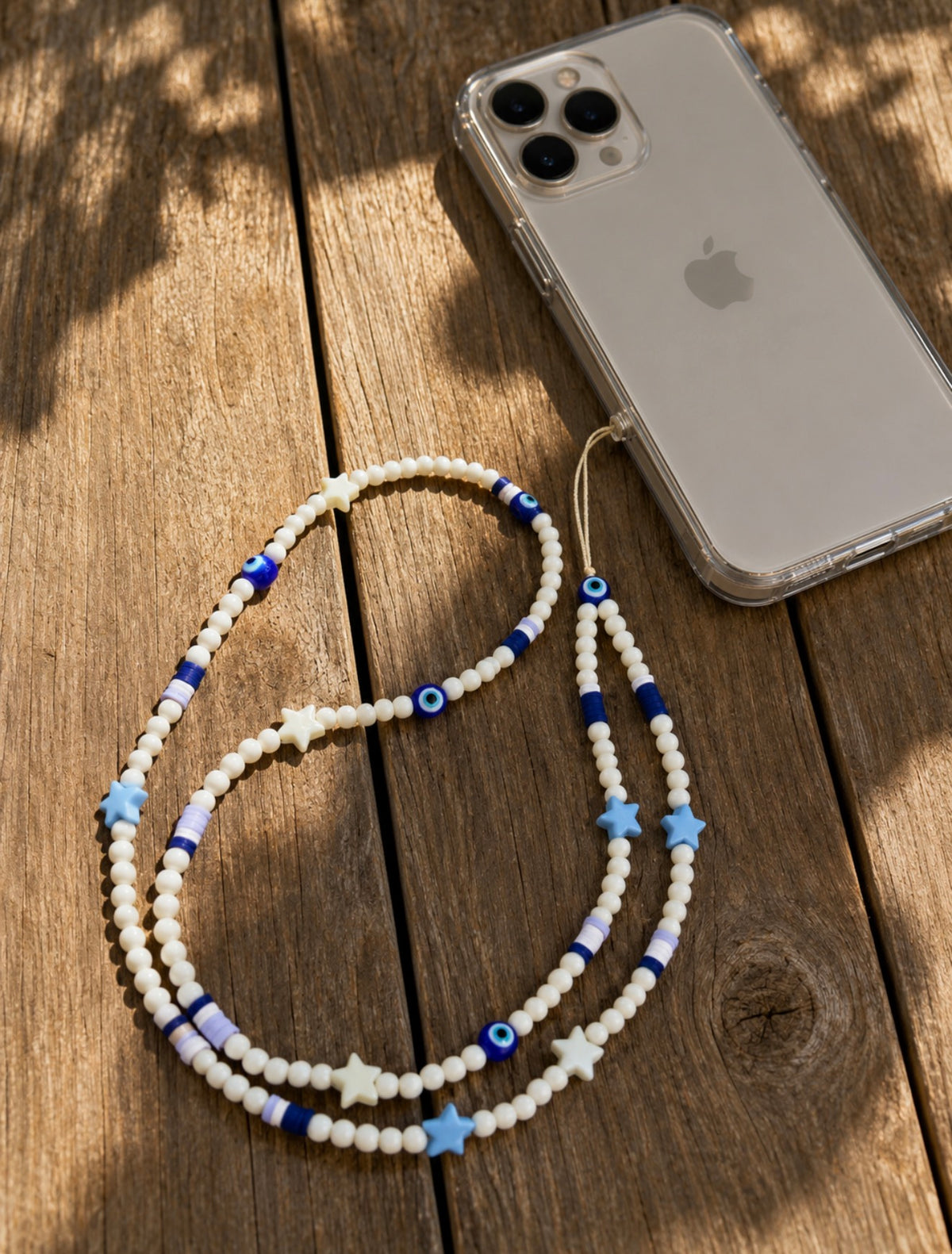 Bijou de téléphone Enola – Dragonne en perles bleues et blanches