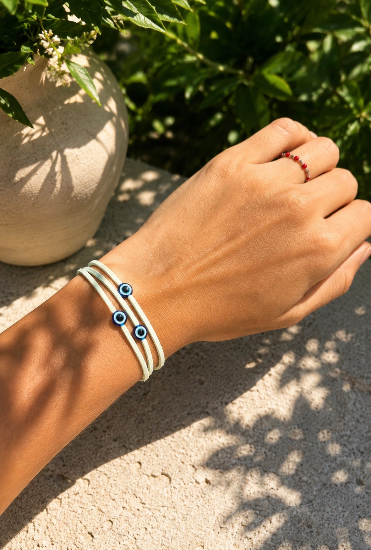Bracelet Œil porte-bonheur – Cordon suédine vert d'eau 3 tours