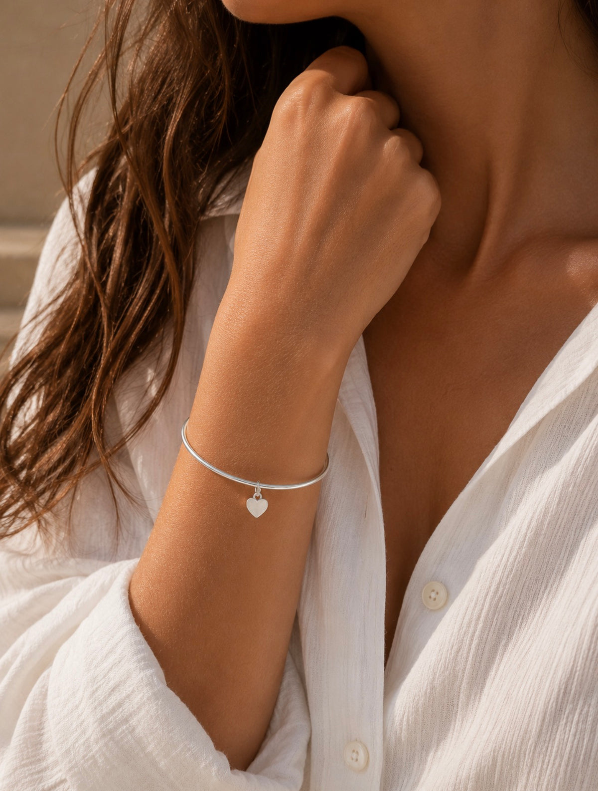 Jonc Lyséa – Bracelet argenté avec breloque cœur en acier inoxydable